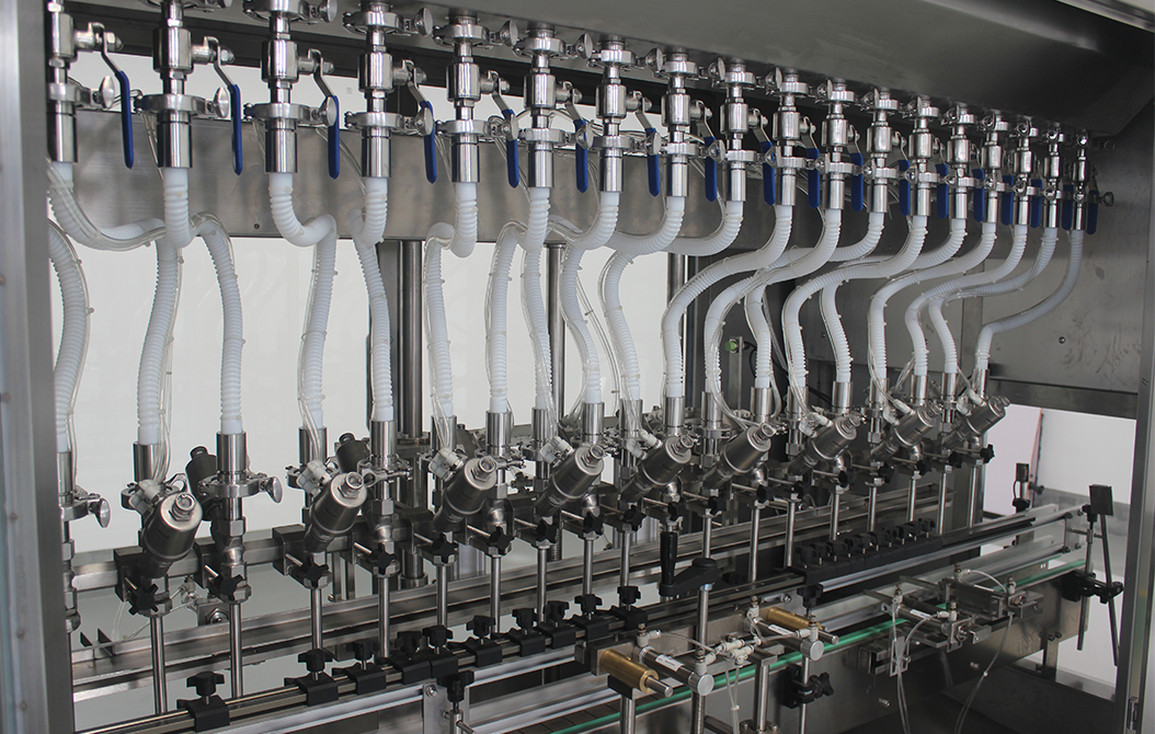 Gravity filling machine nozzles